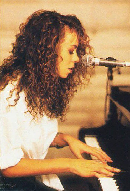 Mariah Carey at the piano